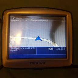 TomTom with holder and charger working black mark on screen