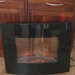 wall mounted electric fire, has two heat settings good working order