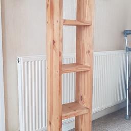 a nice bookshelf with 4 shelves, roughly 5ft 4
has a few marks and writing on it but otherwise in excellent shape