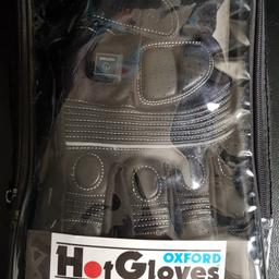Size Large Oxford Heated Motorbike Gloves Brand New Never Been Worn come with bag and all cables. RRP £150