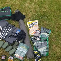 Loads of freshwater fishing gear, no longer used and taking up space. Rod, real, holders, alarms, nets, fishing umbrella with zip on back, tackle, bait, seat bag, fresh bait bag and lines. St. Stephen