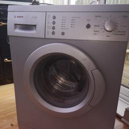 Bosch silver washing machine. Still in working order but maybe needs new brushes so noisy on spin. 
Must collect.