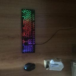 Wired light up keyboard and wireless light up mouse keyboard has been used once the mouse has never been used