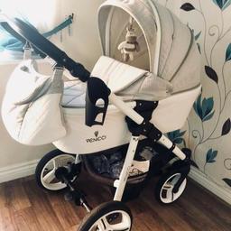 venicci pram beautiful pram looking to sell for a stroller now. comes with matching changing bag carrycot as pictured and bigger seat unit. rain cover included.