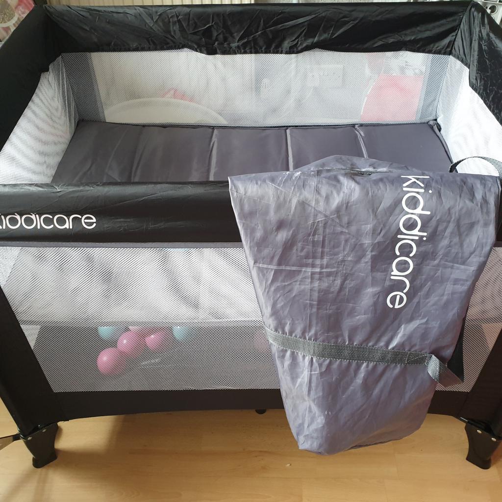 Kiddicare travel outlet cot