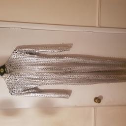 Silver body suit size 8 with little holes design zip up