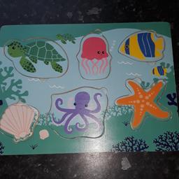 wooden puzzle
sealife
6 pieces
1 piece has wear marks as seen in last picture but doesn't effect its use.
It is used but in great condition otherwise.
It has small cut outs for easy to pull out and put in the pieces.