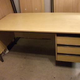 A larger size office desk measuring approx width 153cm x depth 76cm x height 72cm. There is a small area of damage to the top surface of the desk near the back, hence the very low price. I have shown this in some of the pictures next to a 10p so you can judge the size of it. In most cases this mark will be covered by a computer or other office equipment. Willing to deliver locally for £5.00 once you have viewed it and paid, Otherwise cash on collection.