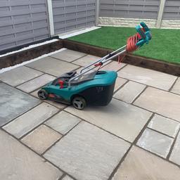 Works perfectly well,has height adj and grass collection.
