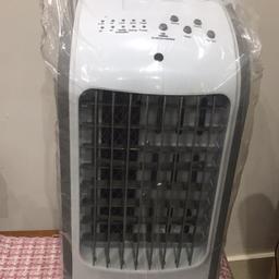 An Air cooler with 5 different speeds which also includes a timer and a rotating setting.