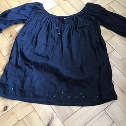 Ladies cotton top size 18 F & F three quarter 
Sleeves tied front fine cotton lawn black sequin trim on bottom