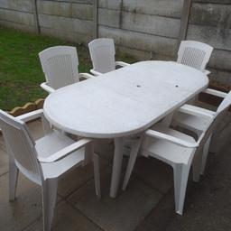 Large family table with 6 chairs also extra 2 (8 total). About 3 years old but good strong set, a little weathered on some of the chairs but nothing a good clean with some reviver won't sort.

This Was a very expensive set as its not flimsy like some and comfortable. buyer to collect or maybe able to deliver locally for free or small fee but only once buyer views and pays for it