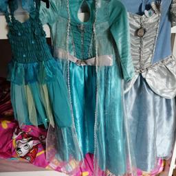 £7 for all including 3 dressing up dresses, 2 pairs of school trousers and 2 school skirts, 1 body warmer, minnie mouse jumper and 1 winter outfit with penguins.