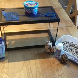 like new ex condition 15.5in by 9.5in by 8in
comes with
Marina internal filter model A-131 240v
2 x Marina cartridges (brand new in packet)
3 Egyptian style ornaments
1/2 bottle of fish health treatment
net
1/2 tubs of aquarium fish flakes 50g tub

bargain
£30ono