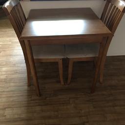 Table and 2 Chairs - one chair has a small scuff which can be easily sanded and painted