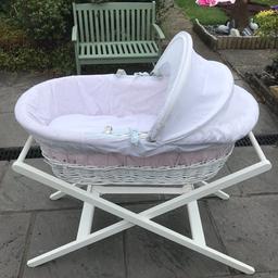Lovely Moses basket,the under lining is pink but this can be removed,comes with the mattress,sheet and stand all pictured.  Great deal!

Collection from ch46