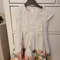 White dress with pretty flowers, only worn twice. Pick up or deliver for cost.