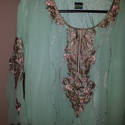 beautiful asian suit never worn.. size large or x large with beautiful dupta n shwlar .