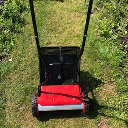 This is a push along mower with a grass collection basket. It’s only ever been used once as I bought a petrol one instead
