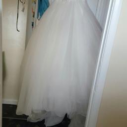 white massive wedding dress size 8. never got the change to wear it. 

Looking for £80 to £100.

Collection Only from feltham