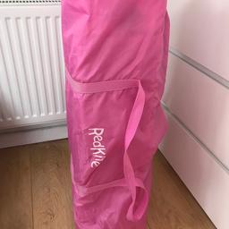 Pink redkite travel cot 
Comes in bag 
Great condition used once