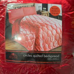 Brand new polyester bed spread in red colour.Comes in original packing.