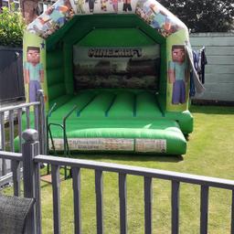 12x15 bouncy castle for sale excellent condition including blower and pegs