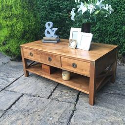 A stunning solid birch wood BALMORAL Coffee Table finished in a honey tone.

3 drawers for extra storage and a shelf below the drawers.

Makers mark on inside of drawer.

Some scratches to top, would benefit a sanding hence the price

RRP £378 and still in Laura Ashley catalogue and on their website

Dimensions 110cm W x 60cm D x 47cm H

Collection Birstall WF17 or delivery within 50 miles for an additional fee
