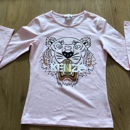Girls kenzo top aged 10 .worn once, immaculate.
£86 brand new .