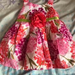 Beautiful dress 6-12 months . Excellent condition