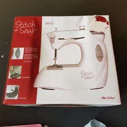 stitch and sew table top sewing machine. 
handle small sewing machine. unused still in original condition and box. 
box has some dampness but machine unaffected. 
originally bought from dunelms.