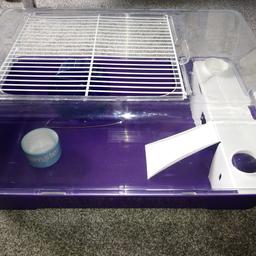 Lovely hamster cage with wheel and ceramic bowl ( plastic one has been chewed but still ok).All disinfected and ready to go. No drinking bottle as needs a new one.Good condition £8 .Collection only .