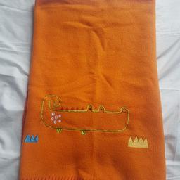 Soft orange crocodile baby blanket. Pre-owned in great condition.