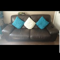 dark brown leather sofa. 3 and 2 seater. from a smoke and pet free home. slightly worn on the 2 seater. any questions please ask free to any1