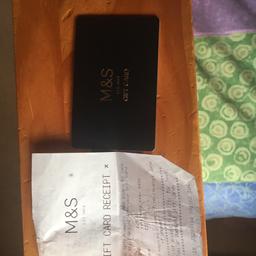 £25 M&S gift card with receipt. 
Obviously unused, and the pin on back of the card has not been scratched off.