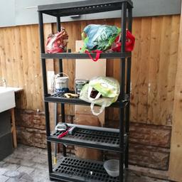 Sturdy tubelar metal and heavy duty black plastic unit.
5 shelves high.
Space between shelves is 40 cm
Overall height 165cm
Width (left to right) is 82cm
Depth (front to back) is 40cm

Not sure if it will dismantle for transit.