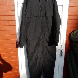 black thermal suit new with tags this is really thick and warm suitable for really cold conditions it has a full length zip makes it easy to get it on and off size on label is
190cm length and 120 chest.