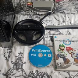 Black Wii console, 1 controller, 1 steering wheel, Mario kart and Wii sports. Complete set up. Fully working.

Collection L14 or I can deliver if local