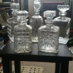 5 glass decanters all different