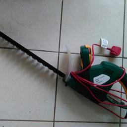 Here we have a B&Q 400 watt electric hedge trimmer - hardly used so it's now for sale - can deliver local around Moreton for 2 quid