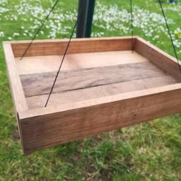 Hand Made form good quality mehogany and should last years of use a very nice gift idear for people who love bird watching. perfect for hanging in trees or from a shead or bird feader stand.  this is for wooden tables only no stands included