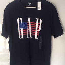 Brand New. With Tags. Never Worn. Excellent Condition.

Large. Gap. Navy T-Shirt with American Flag Design and GAP logo.

COLLECTION OR LOCAL DROP OFF ONLY.
Also available to Stevenage/SG2-Hertfordshire.