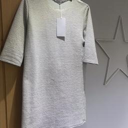 brand new with tags Zara size small paid £19.99 for this - lovely black and white stripe. can be worn as a dress or over jeans. looks great with a long necklace :)

having a wardrobe clearout so check out my other items!