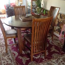 For sale is round table and four chairs the table can extended In good condition can be viewed in Wickford Essex.cost a fortune new so grab a bargain.