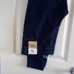 New Sz 14 pair of jeggings with 2 pockets