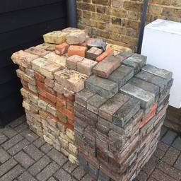 Pile of assorted bricks and block pavers