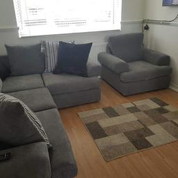 grey corner sofa and chair immaculate condition less than 2 months old will swap for a black leather corner or a 2 and 3 seater has to be in immaculate condition or will sell. collection only