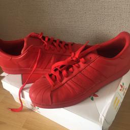 Red trainers new worn once or twice
Special edition