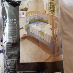 transport cot in a bag set includes cot bumper ,coverlet and plain flat sheet.
used but in very good condition.