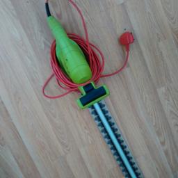 brand new electric hedge trimmer - 
perfect working condition -
can deliver local to Moreton for 2 quid